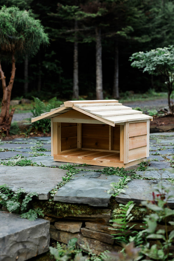 Outdoor cat feeding station, wooden food shelter with extended roof