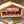 Outdoor cat feeding station - wooden food shelter for feral cats